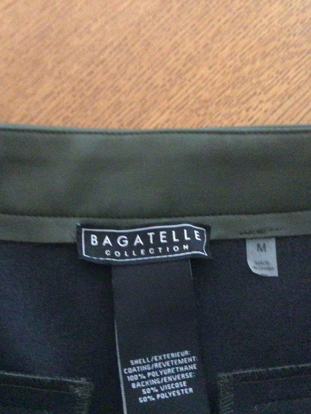 Moss green faux leather wide leg ankle pant.  By Bagatelle. EUC. Size Medium.